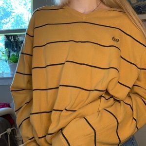 mustard yellow and black striped V-neck sweater